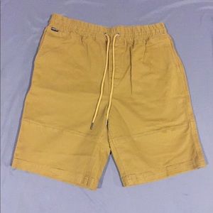 This is a pair of dark khaki chino’s by Empyre ...